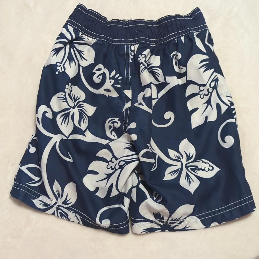 Old Navy boys Navy Blue And WhiteHawaiian Flowers Print Size 2T swim trunks